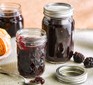 Apple and blackberry jam in jars