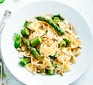 Asparagus, chilli & feta farfalle on a white plate