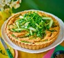 One asparagus, rocket, caper & hollandaise tart