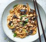 Aubergine & sesame dan-dan-style noodles served with chopsticks