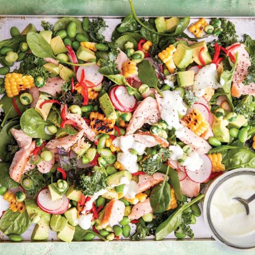 Hot smoked salmon salad with wasabi dressing