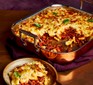 Macaroni cheese lasagne served in a large serving dish