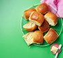 Milk buns on a wire rack