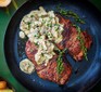 A serving of sirloin steak & creamy mushroom sauce