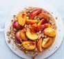 Peach streusel cheesecake served on on dish