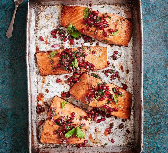 Pomegranate salmon in a roasting tin