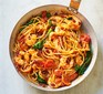 Prawn & harissa spaghetti served in a bowl