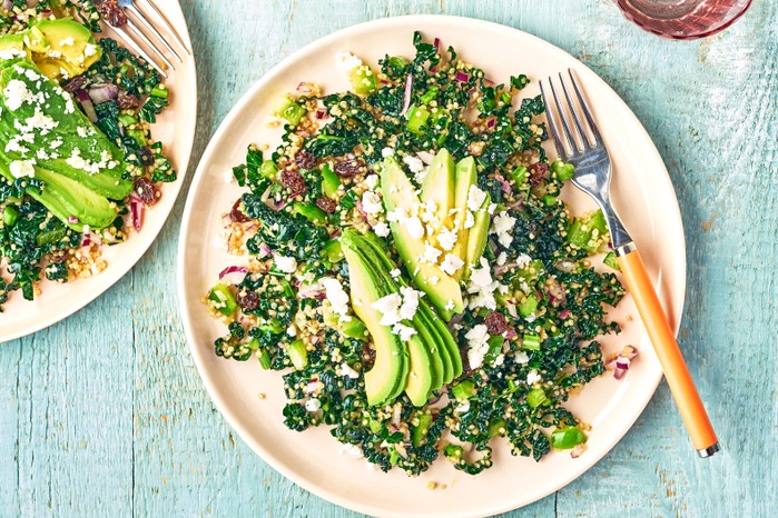 Quinoa with shredded greens, avocado, feta & raisins