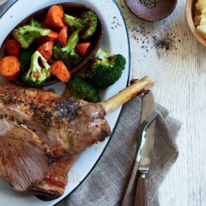 Roast lamb dinner with skordalia
