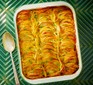 Scalloped garlic, lemon & cream potato gratin in a baking dish