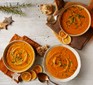 Three bowls of slow-cooker pumpkin soup