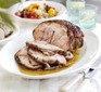 Sliced roast pork shoulder with sauce