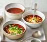 Smoky tomato, chipotle & charred corn soup in three bowls