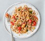 A plate serving healthy bolognese with a fork