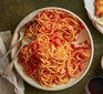 Spicy tomato spaghetti in a large bowl