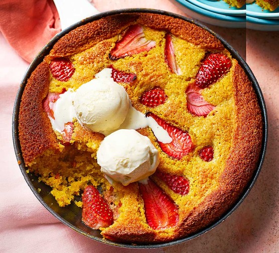 Strawberry, almond and polenta skillet cake in a skillet