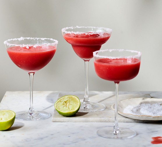 Frozen strawberry margarita in three glasses