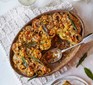 Wild mushroom and chestnut rotolo in an oval casserole dish